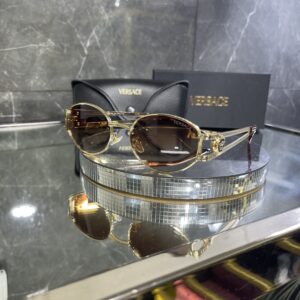 Versace oval metal kahve cam gold aksesuar 419