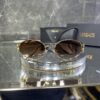 Versace oval metal kahve cam gold aksesuar 419
