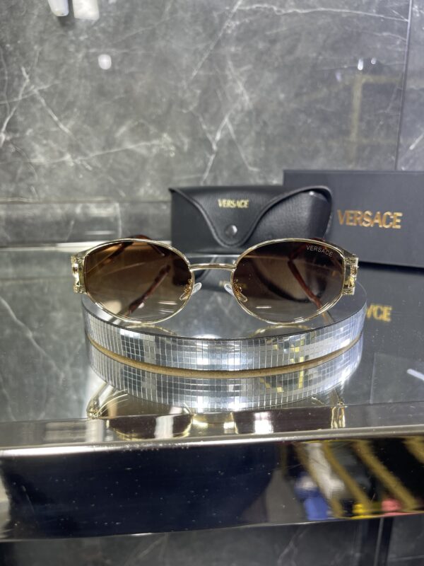 Versace oval metal kahve cam gold aksesuar 419