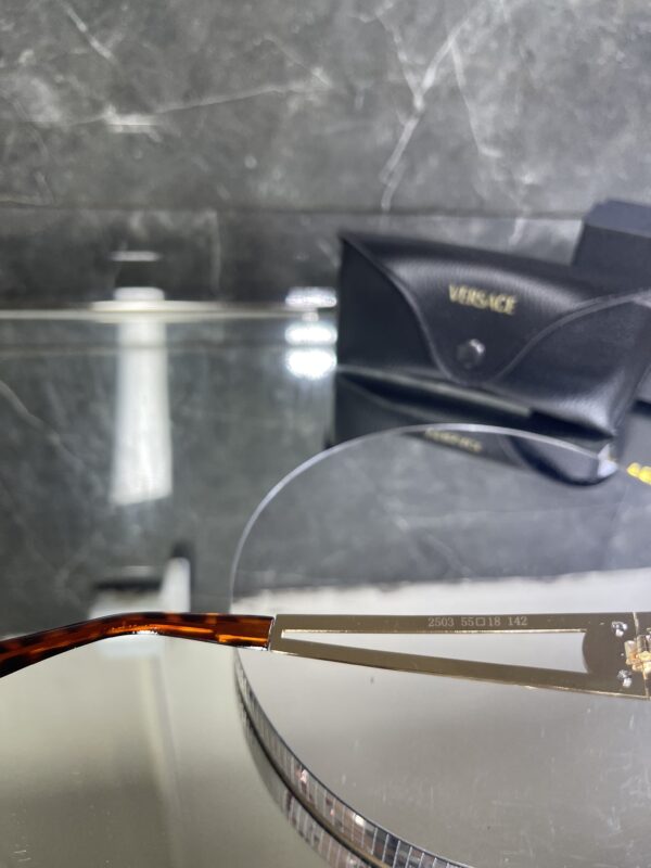 Versace oval metal kahve cam gold aksesuar 419
