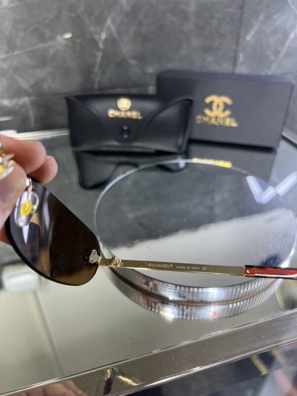 Chanel geometrik kahve cam 404