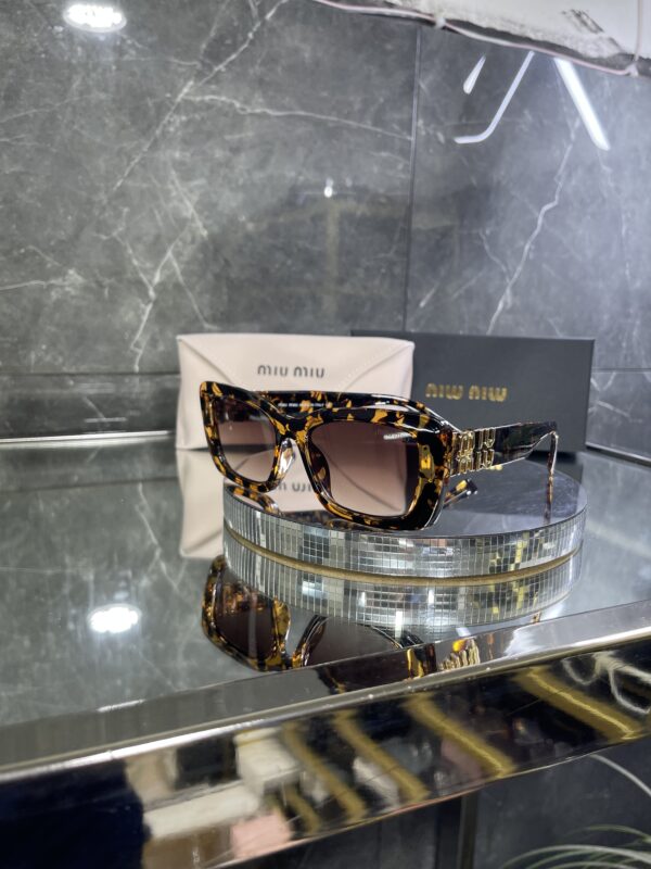 Miu Miu Geometrik Leopar Çerçeve Kahve cam 544