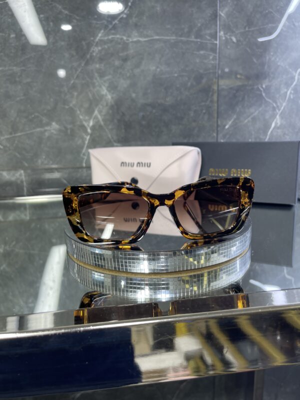Miu Miu Geometrik Leopar Çerçeve Kahve cam 544