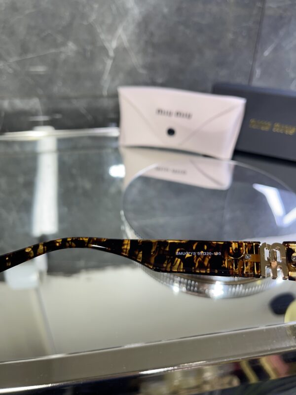 Miu Miu Geometrik Leopar Çerçeve Kahve cam 544