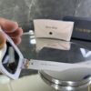 Miu Miu Geometrik Beyaz Çerçeve Siyah cam 543