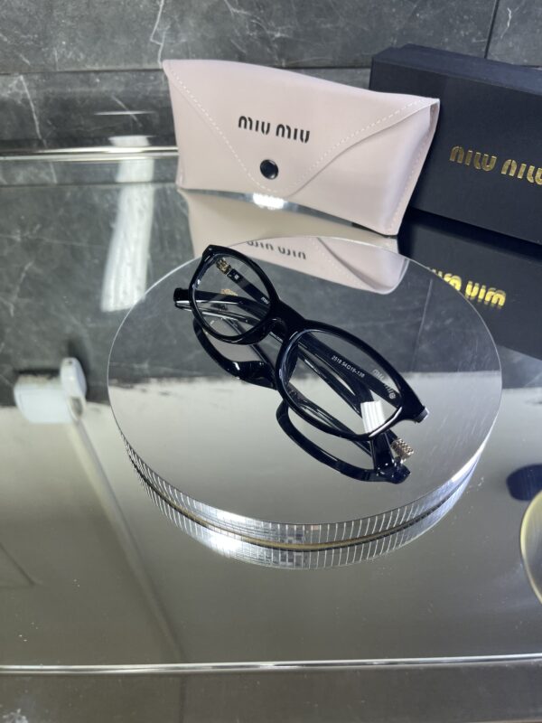 Miu Miu geometrik siyah çerçeve şeffaf cam 536