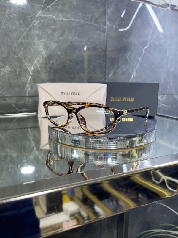 Miu Miu geometrik leopar çerçeve şeffaf cam 534