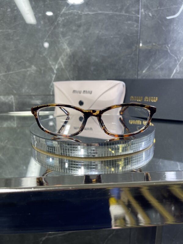 Miu Miu geometrik leopar çerçeve şeffaf cam 534