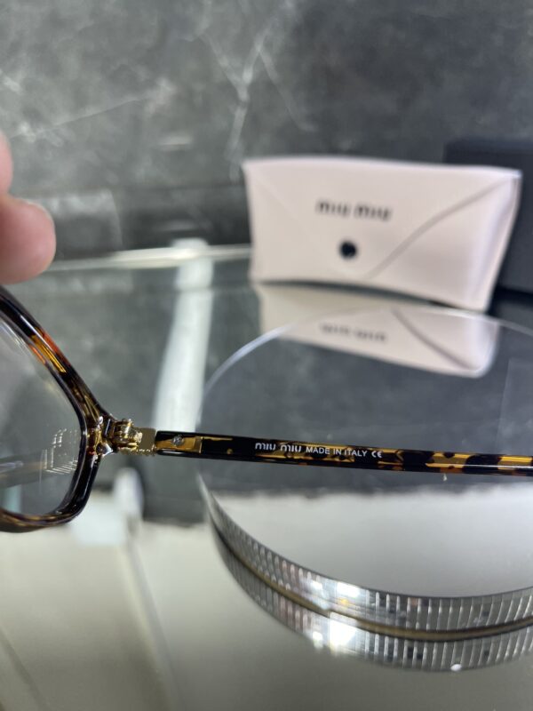 Miu Miu geometrik leopar çerçeve şeffaf cam 534