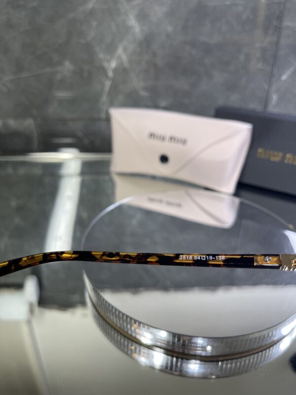 Miu Miu geometrik leopar çerçeve şeffaf cam 534