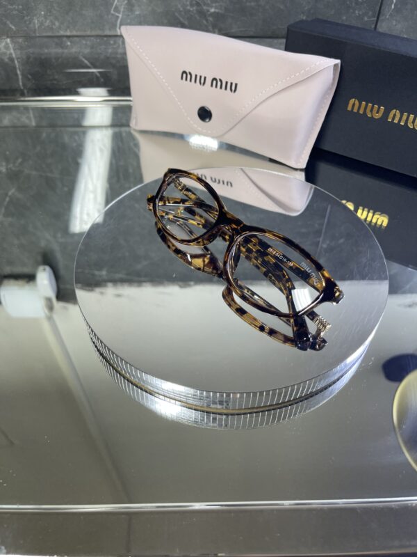 Miu Miu geometrik leopar çerçeve şeffaf cam 534