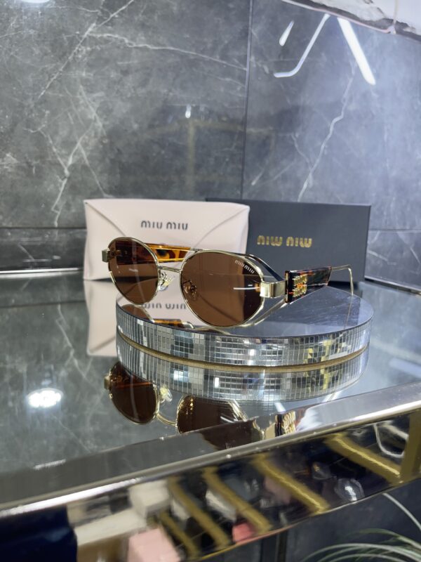 Miu Miu Oval kahve cam 533
