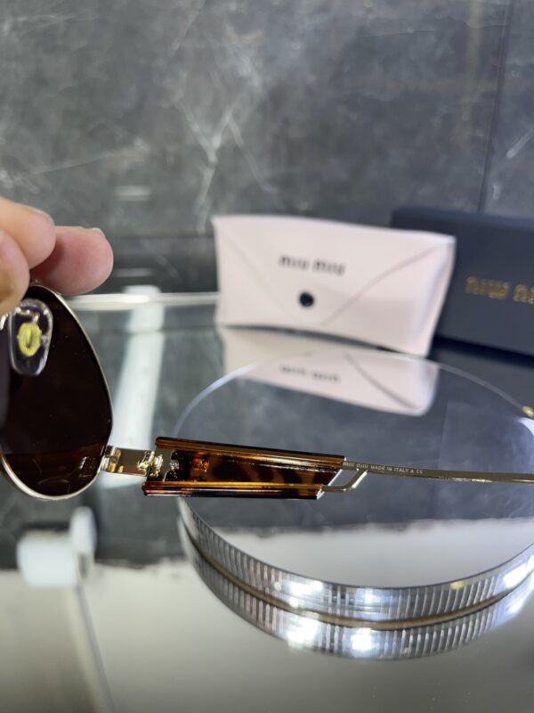 Miu Miu Oval kahve cam 533