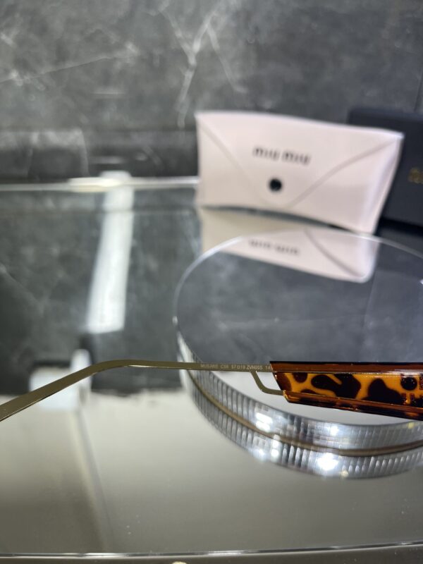 Miu Miu Oval kahve cam 533