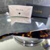 Miu Miu Geometrik Leopar çerçeve Kahve cam gold Miu detay 526
