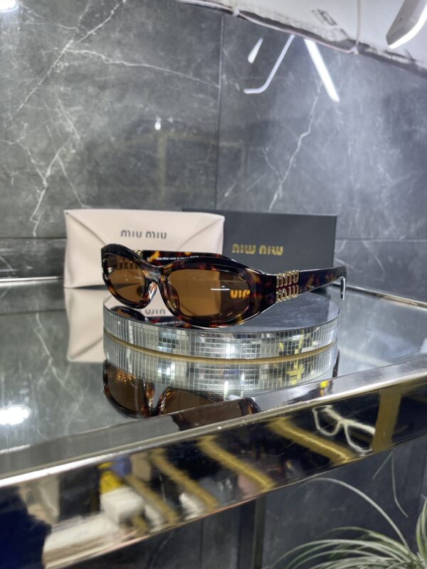Miu Miu Geometrik Leopar Çerçeve kahve cam 523