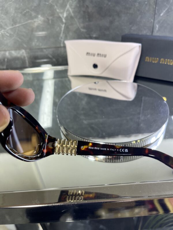 Miu Miu Geometrik Leopar Çerçeve kahve cam 523
