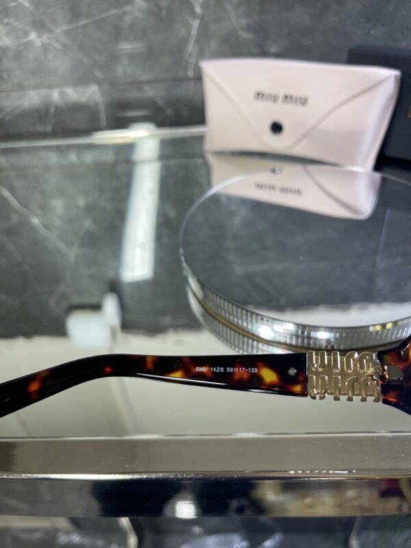 Miu Miu Geometrik Leopar Çerçeve kahve cam 523