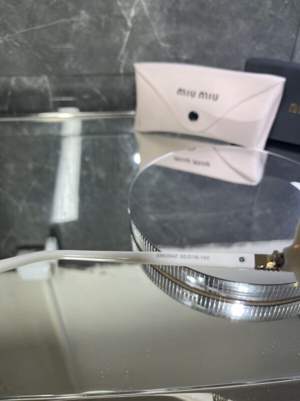 Miu Miu Oval Kahve cam Krem çerçeve 517