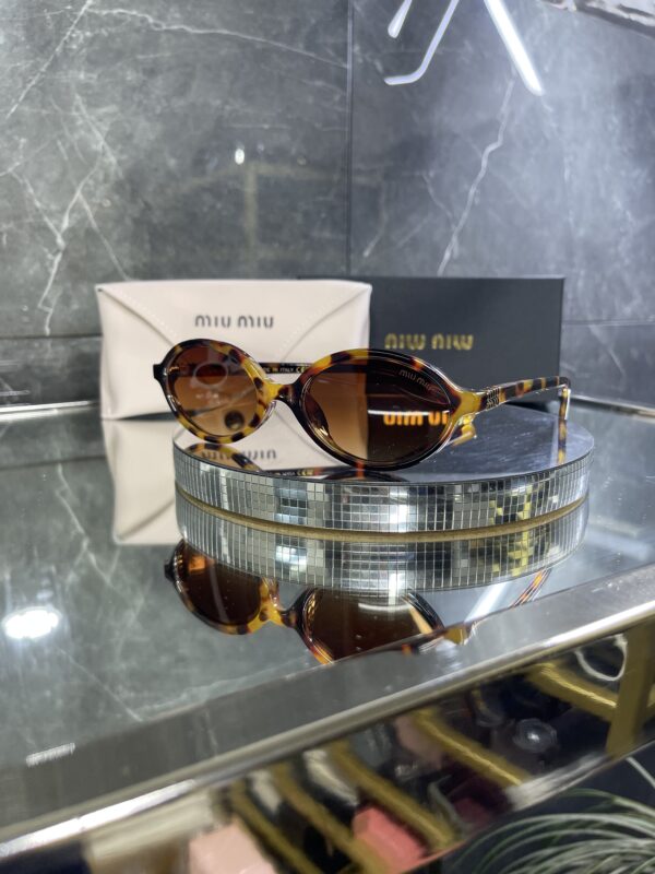 Miu Miu Oval Kahve cam Leopar çerçeve 516