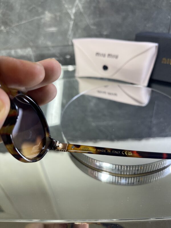 Miu Miu Oval Kahve cam Leopar çerçeve 516