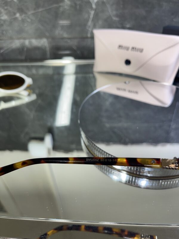 Miu Miu Oval Kahve cam Leopar çerçeve 516
