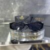 Gucci Oval Siyah çerçeve Siyah cam 560