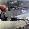 Gucci Oval Siyah çerçeve Siyah cam 560