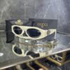 Gucci Oval Krem çerçeve Siyah cam 559