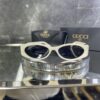 Gucci Oval Krem çerçeve Siyah cam 559