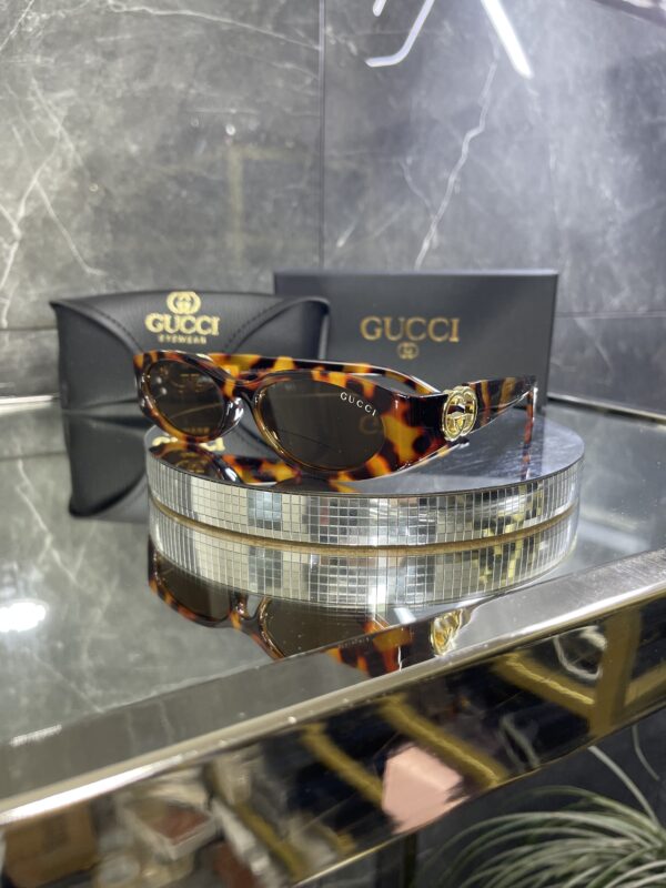Gucci Oval Leopar çerçeve Kahve cam 558