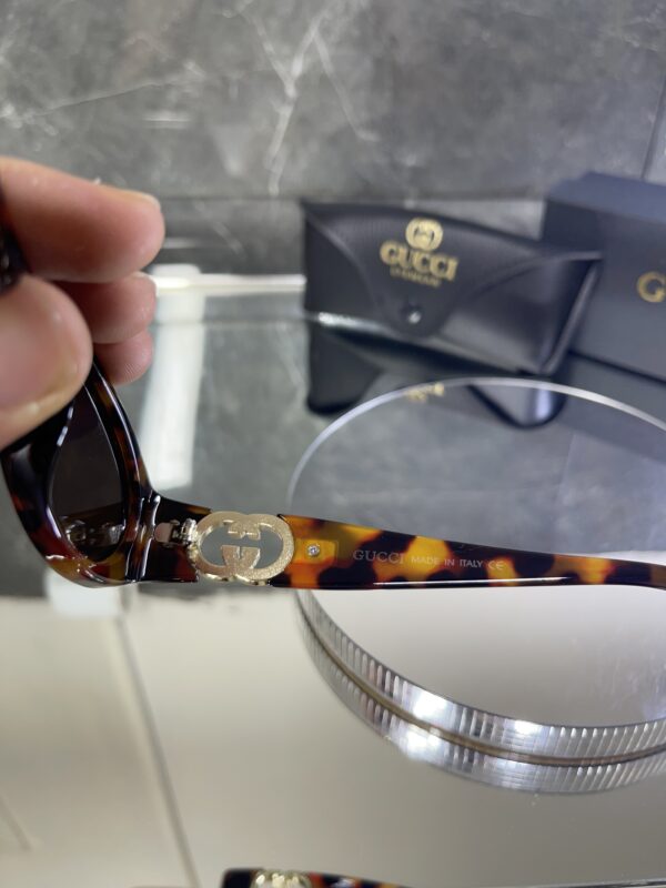 Gucci Oval Leopar çerçeve Kahve cam 558