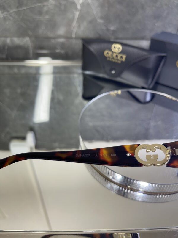 Gucci Oval Leopar çerçeve Kahve cam 558