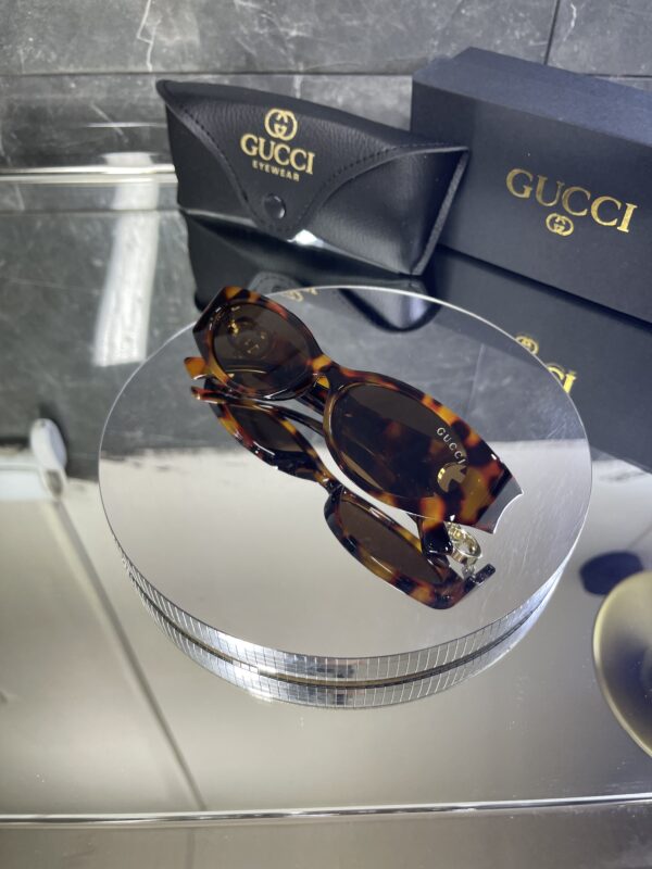 Gucci Oval Leopar çerçeve Kahve cam 558