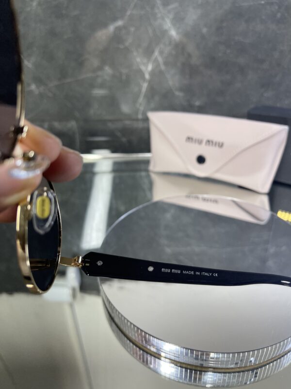 Miu Miu Oval Gold Metal 570