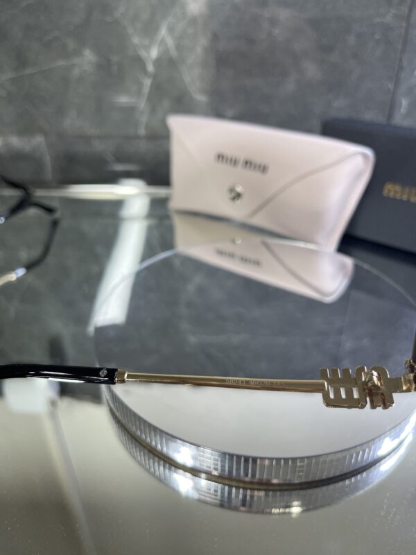 Miu Miu Geometrik Miu detay Kahve cam 609