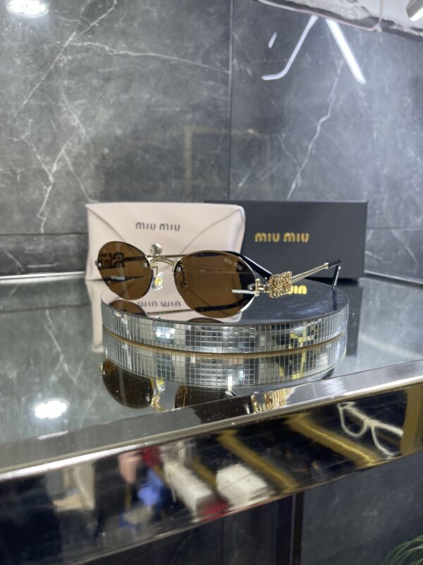 Miu Miu Oval Metal kahverengi cam 606