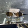 Miu Miu Oval Metal kahverengi cam 606
