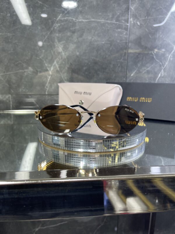 Miu Miu Oval Metal kahverengi cam 606