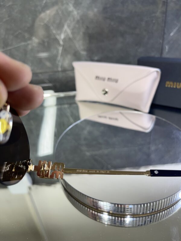 Miu Miu Oval Metal kahverengi cam 606