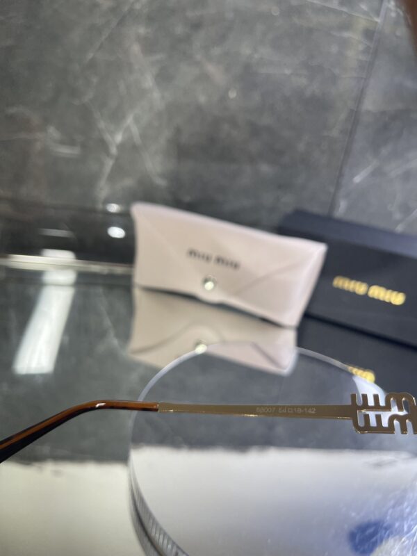 Miu Miu oval metal lila cam gold çerçeve 618