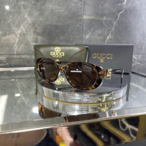 Gucci Oval Leopar Çerçeve Kahve cam 642