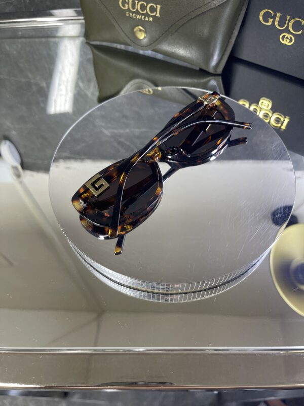 Gucci Oval Leopar Çerçeve Kahve cam 642