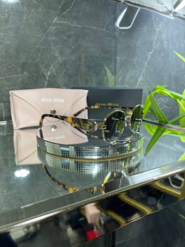 Miu Miu VIP Oval Çerçeve Kahve Cam Leopar detay 691