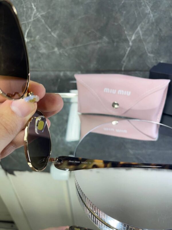 Miu Miu VIP Oval Çerçeve Kahve Cam Leopar detay 691