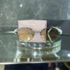 Miu Miu VIP Oval Çerçeve Çok Renkli Cam Beyaz Mermer detay 690